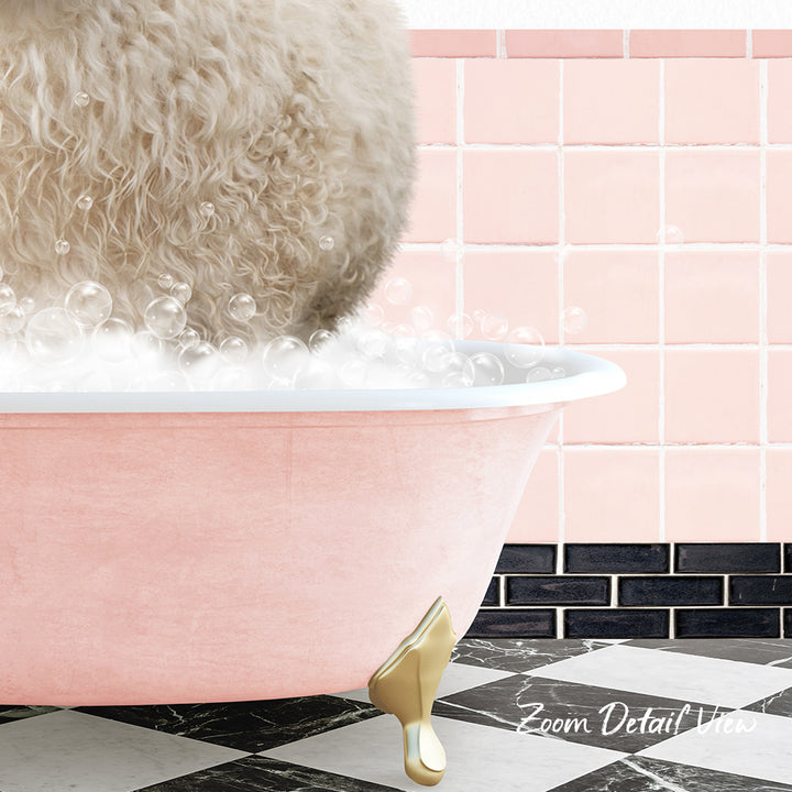 A fluffy white dog is sitting in a pink bathtub filled with bubbles, with a pink tiled wall in the background.