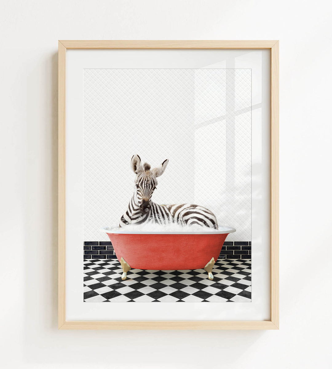 A zebra is sitting in a red bathtub on a black and white checkered floor.