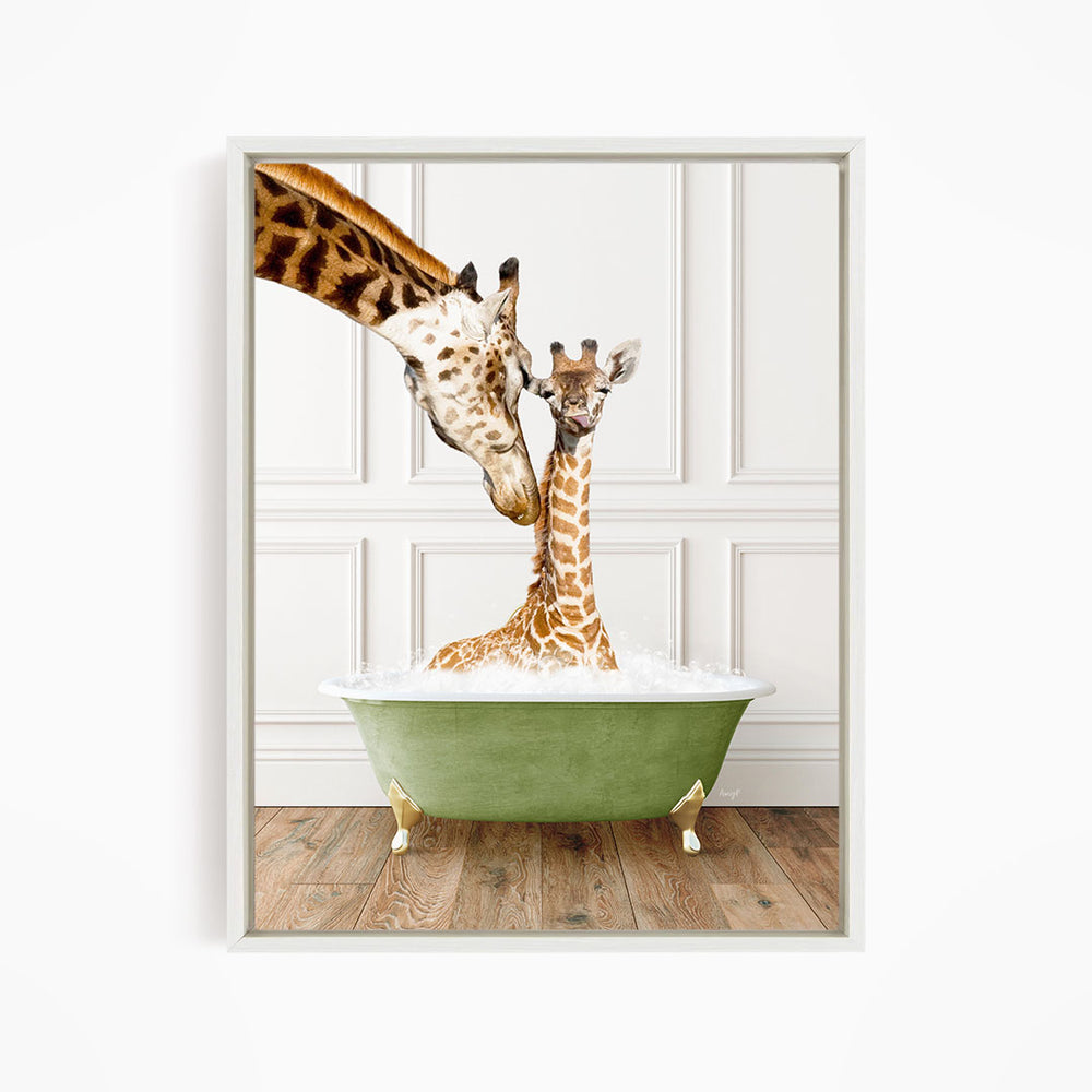 A mother giraffe and her baby giraffe are sitting together in a green bathtub, with the mother gently nuzzling her baby.