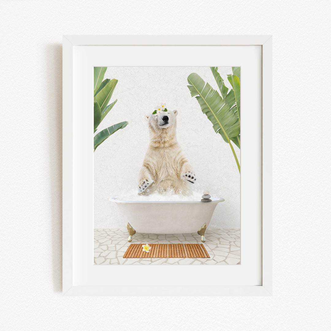 A polar bear standing in a bathtub filled with water, surrounded by green plants and a wooden mat on the floor.