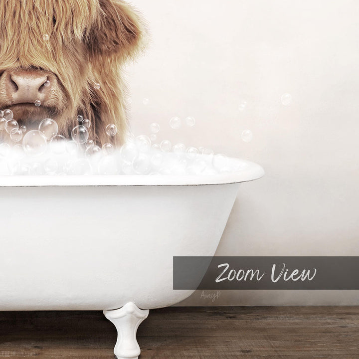 A cow with long hair is sitting in a white bathtub filled with bubbles, creating a whimsical and playful scene.