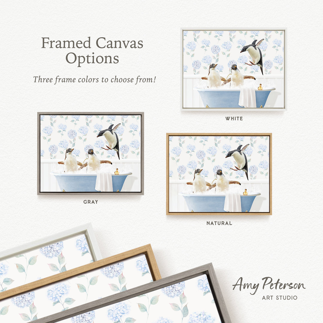 The image is a framed canvas with three different frame colors to choose from: white, gray, and natural. The canvas displays a scene of penguins bathing in a blue tub, with a floral pattern on the wall behind them.