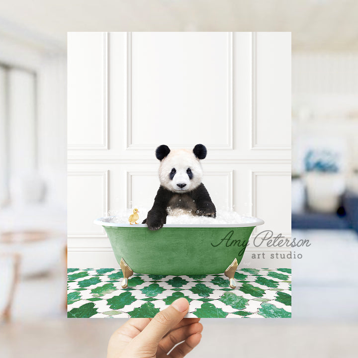 a panda bear sitting in a green bath tub