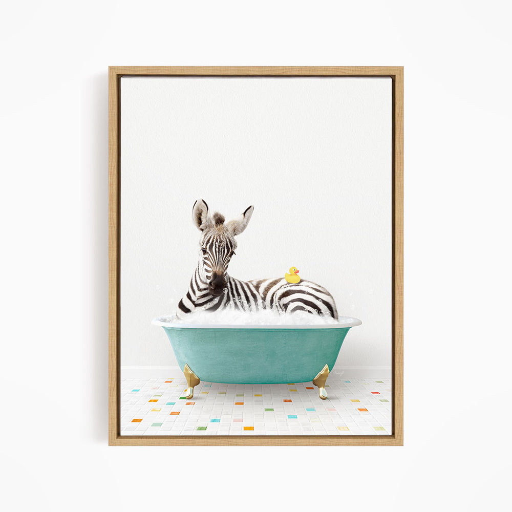 A zebra is sitting in a blue bathtub, with a yellow rubber duck resting on its back.