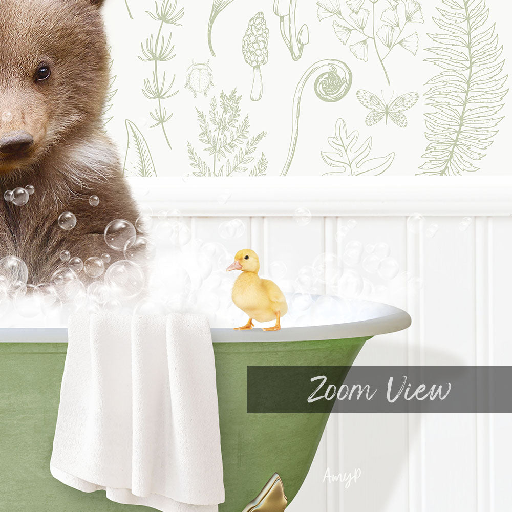 A brown bear is sitting in a green bathtub filled with bubbles, with a yellow duck standing on the edge of the tub.