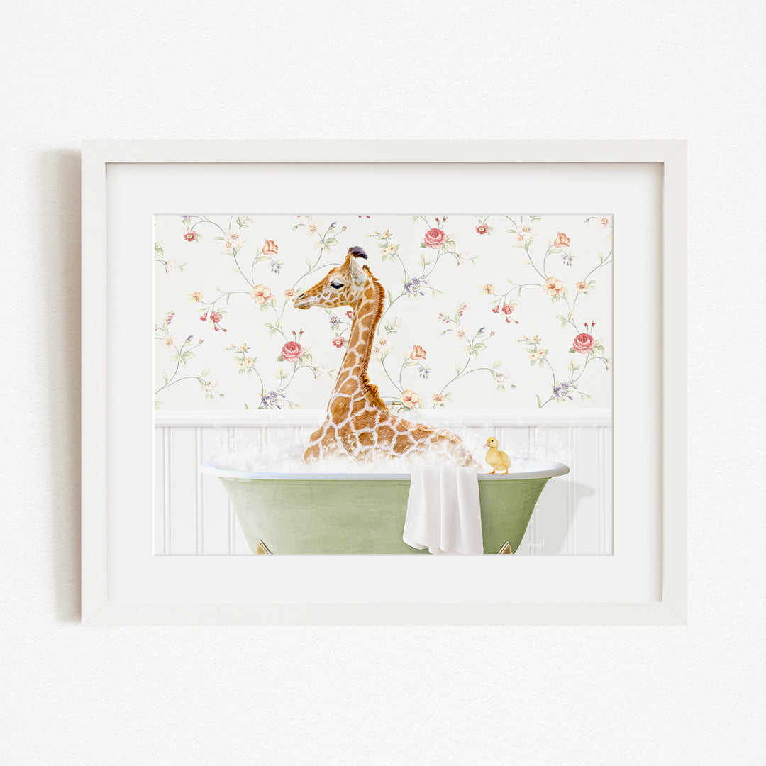 A giraffe sitting in a green bathtub filled with water, surrounded by a floral wallpaper.