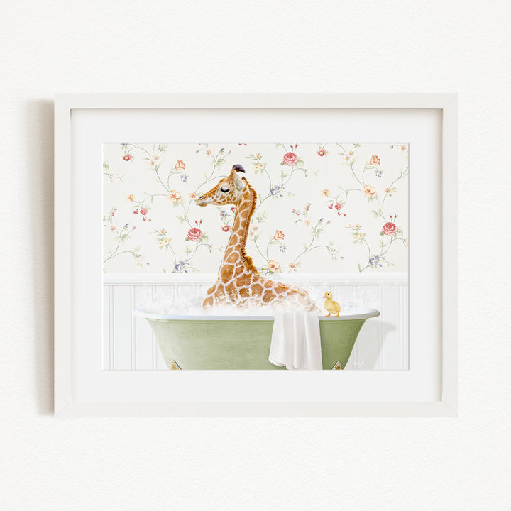 A giraffe sitting in a green bathtub filled with water, surrounded by a floral wallpaper.