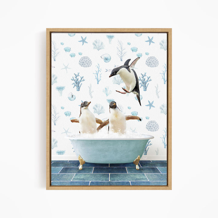 A framed image depicting two penguins sitting in a bathtub, with one penguin flying towards the other.