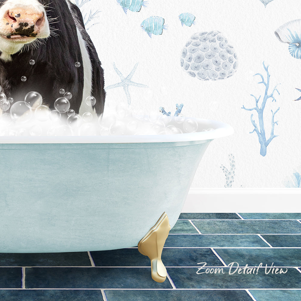 A cow is sitting in a bathtub filled with bubbles, surrounded by a blue and white ocean-themed wallpaper.