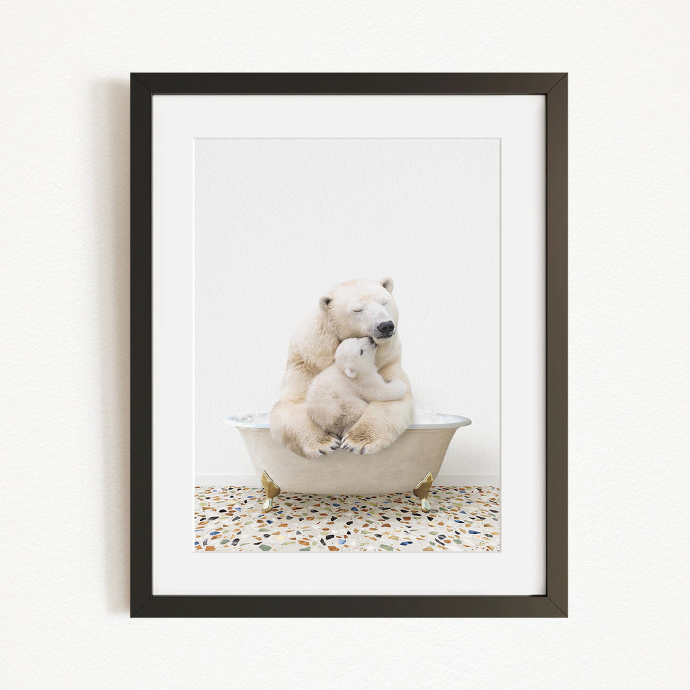 A polar bear and its cub sitting together in a bathtub, with the bear appearing to be hugging the cub.