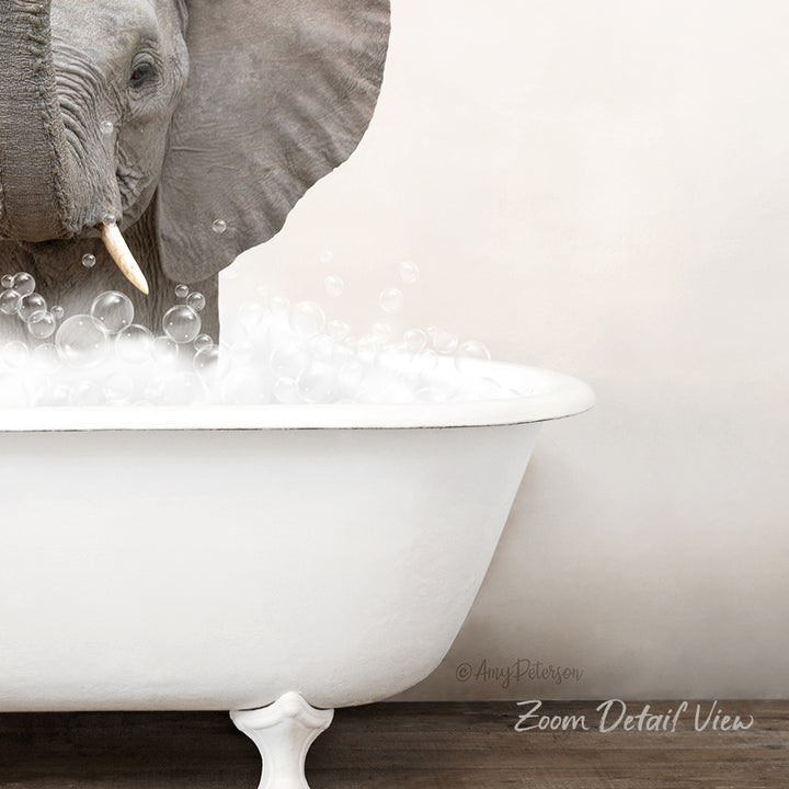 An elephant is standing in a white bathtub filled with bubbles, creating a whimsical and playful scene.