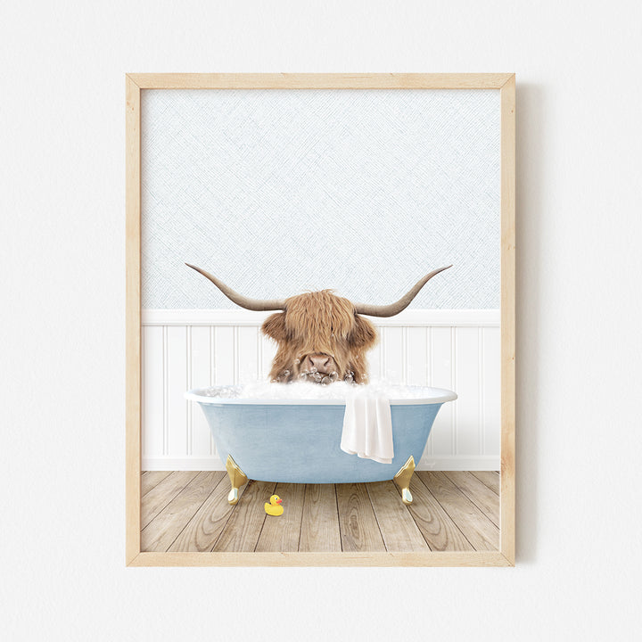 a picture of a bull with long horns in a bathtub