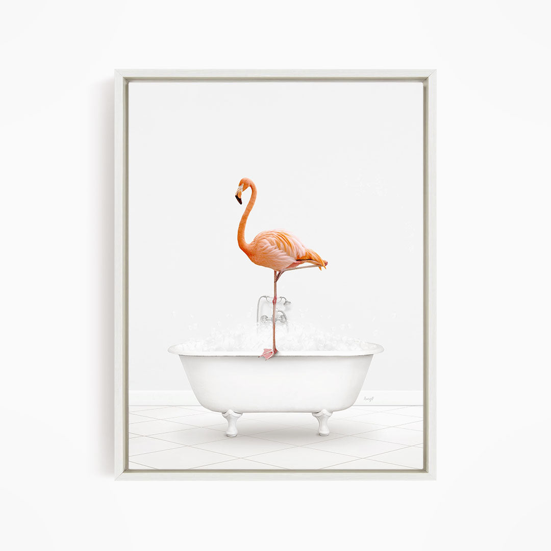A vibrant orange flamingo stands on the edge of a white bathtub filled with water, creating a whimsical and playful scene.