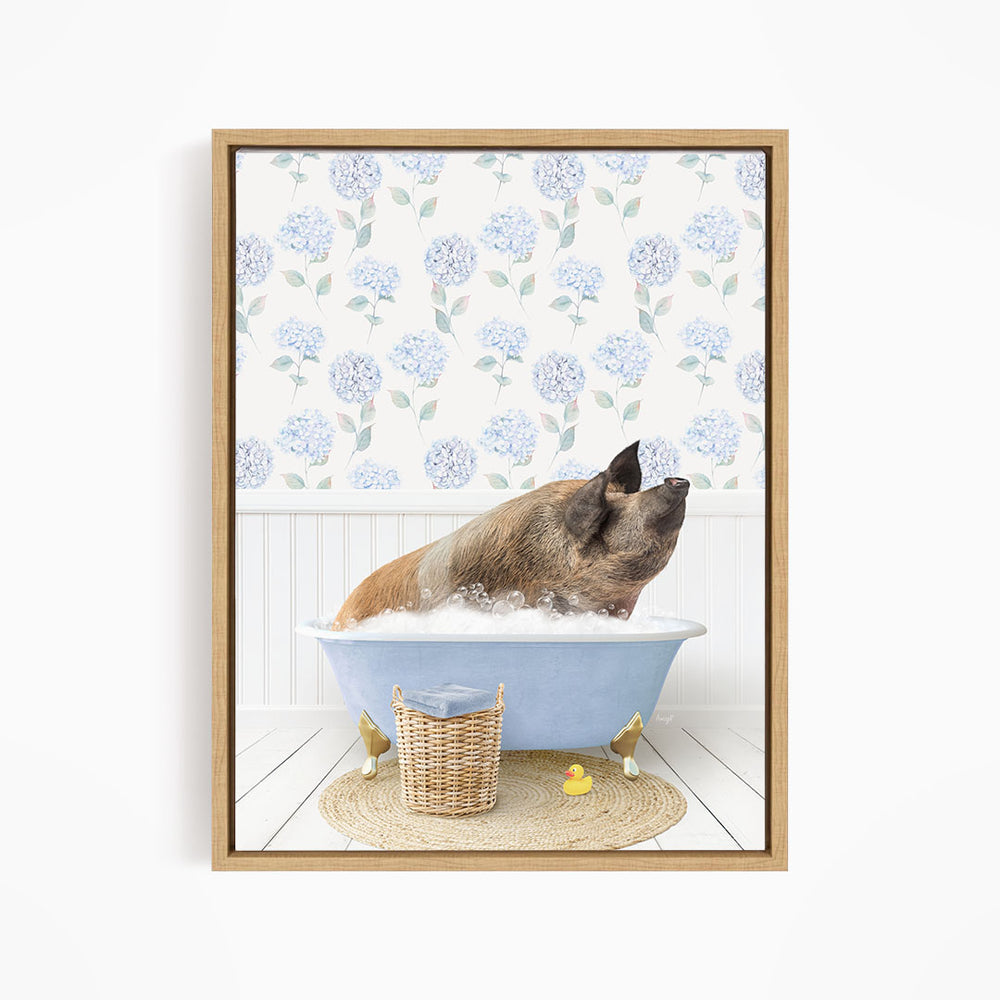 A pig sitting in a blue bathtub filled with water, surrounded by a wicker basket and rubber duckies.