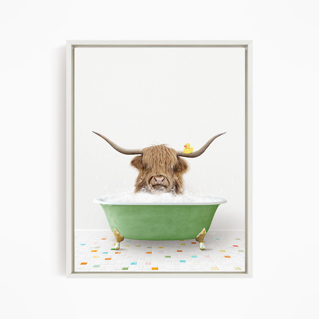 A horned animal, possibly a yak or a cow, is sitting in a green bathtub filled with water, with a rubber duck floating on the surface.