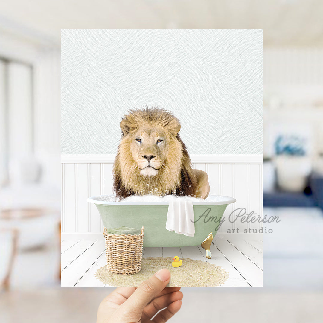 a hand holding a card with a lion in a bathtub