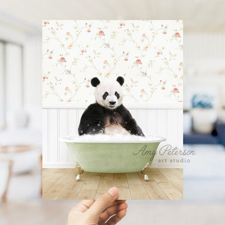 a panda bear sitting in a bath tub