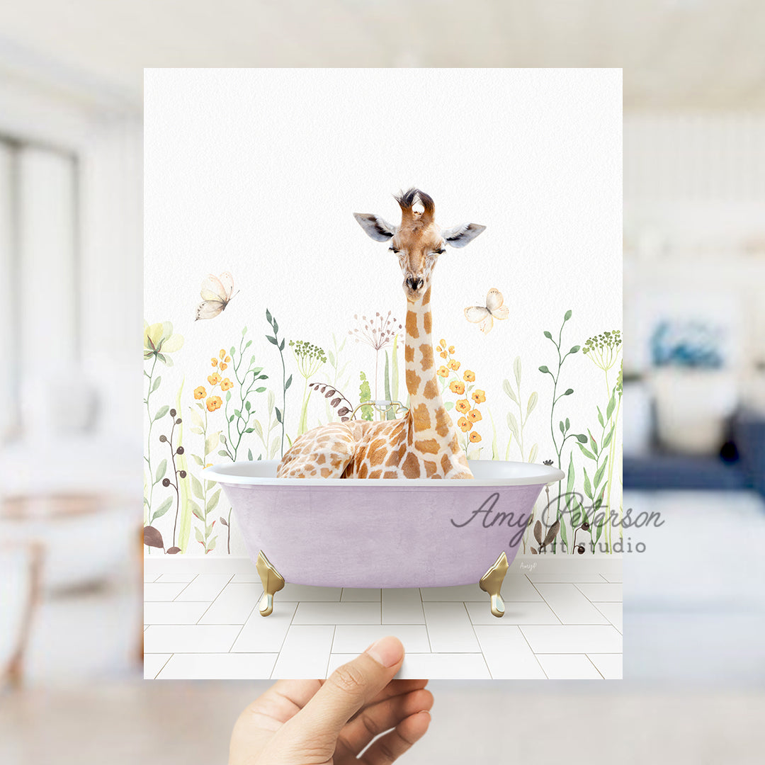 a hand holding up a card with a giraffe in a bathtub