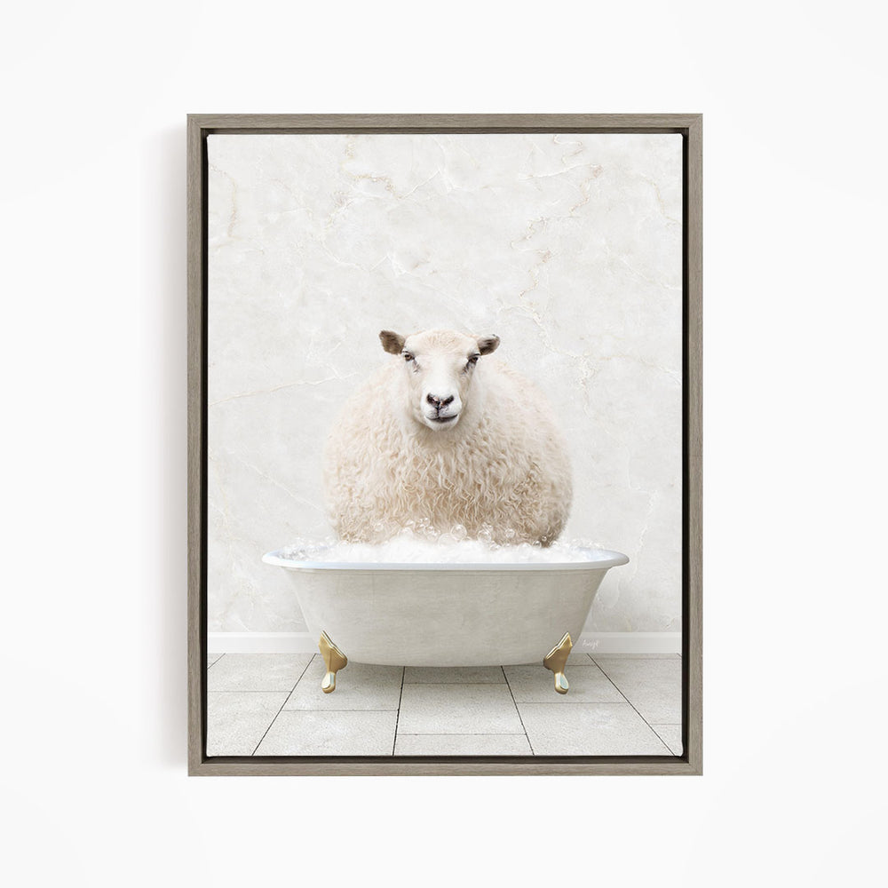 A fluffy white sheep sits in a white bathtub, surrounded by a white marble wall.