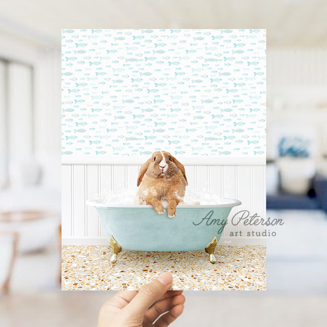 a person holding up a picture of a rabbit in a bathtub