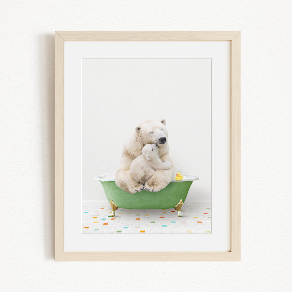 A polar bear and a cub are sitting together in a green bathtub, with a yellow rubber duck floating nearby.