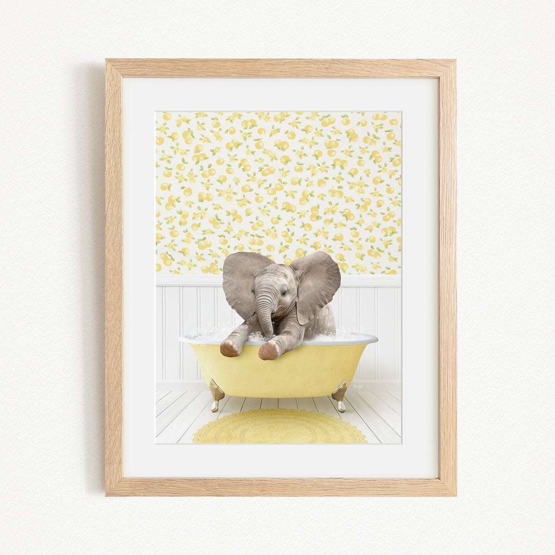 A baby elephant sitting in a yellow bathtub, surrounded by a yellow and white floral pattern on the wall behind it.