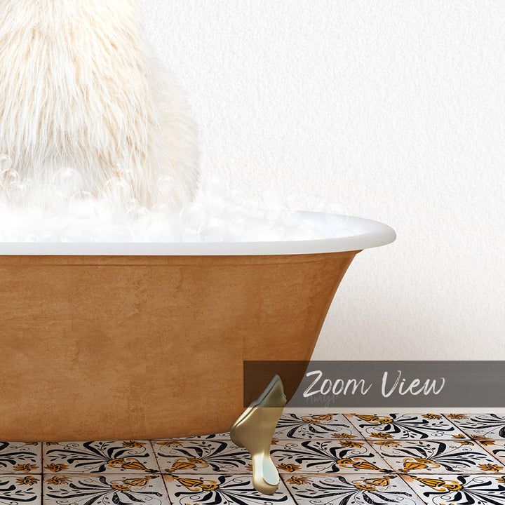 A fluffy white cat is sitting in a bathtub filled with bubbles, with a gold bathtub faucet visible.
