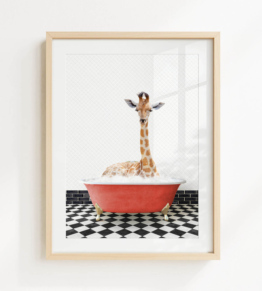 A giraffe is sitting in a red bathtub filled with bubbles, surrounded by a black and white checkered floor.