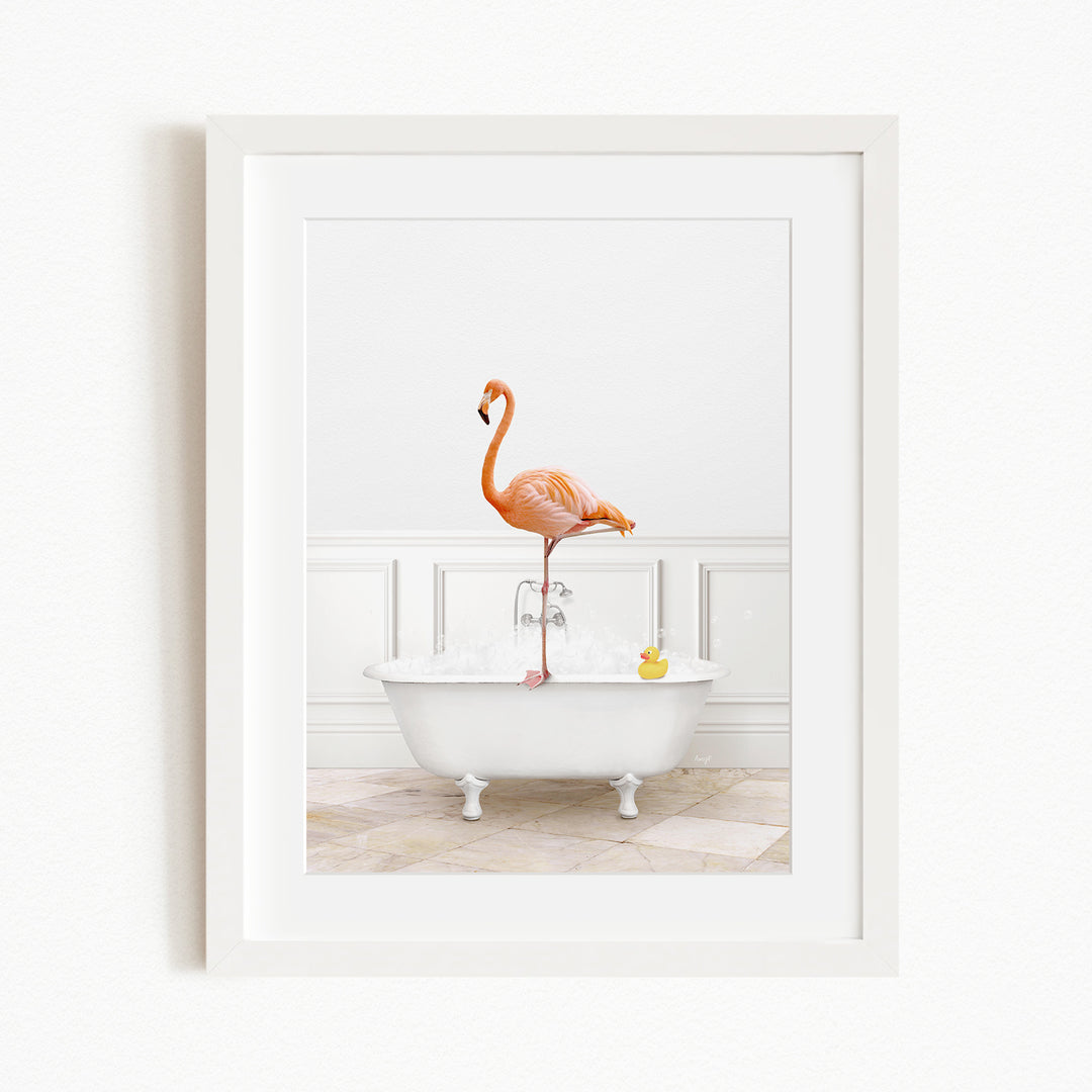 A pink flamingo stands on the edge of a white bathtub filled with water, with a yellow rubber duck floating in the water.