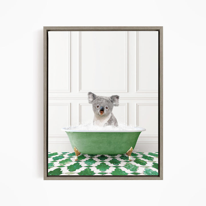 A koala bear sitting in a green bathtub filled with water, surrounded by a green and white patterned floor.