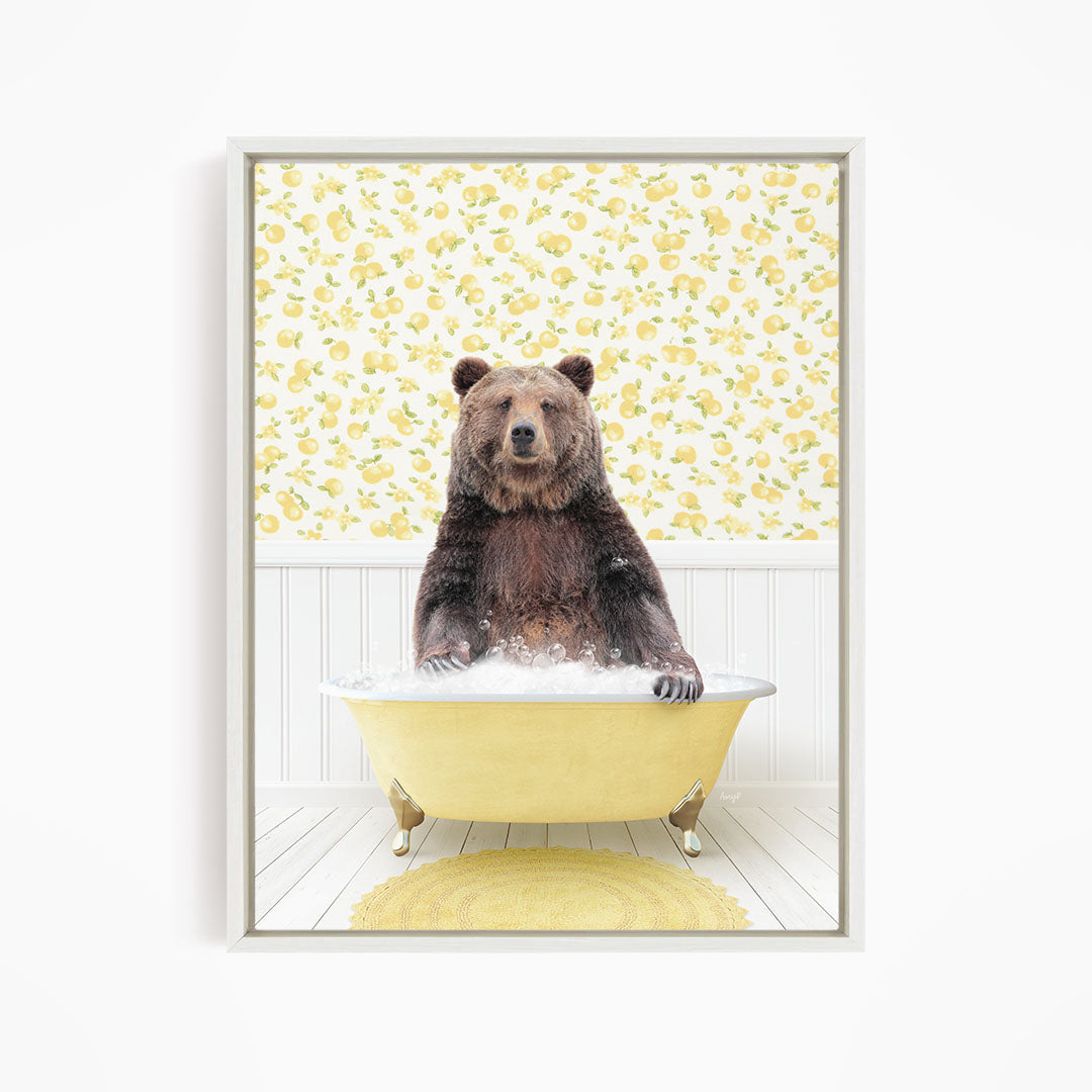 A brown bear sitting in a yellow bathtub filled with water, surrounded by a yellow floral patterned wall.