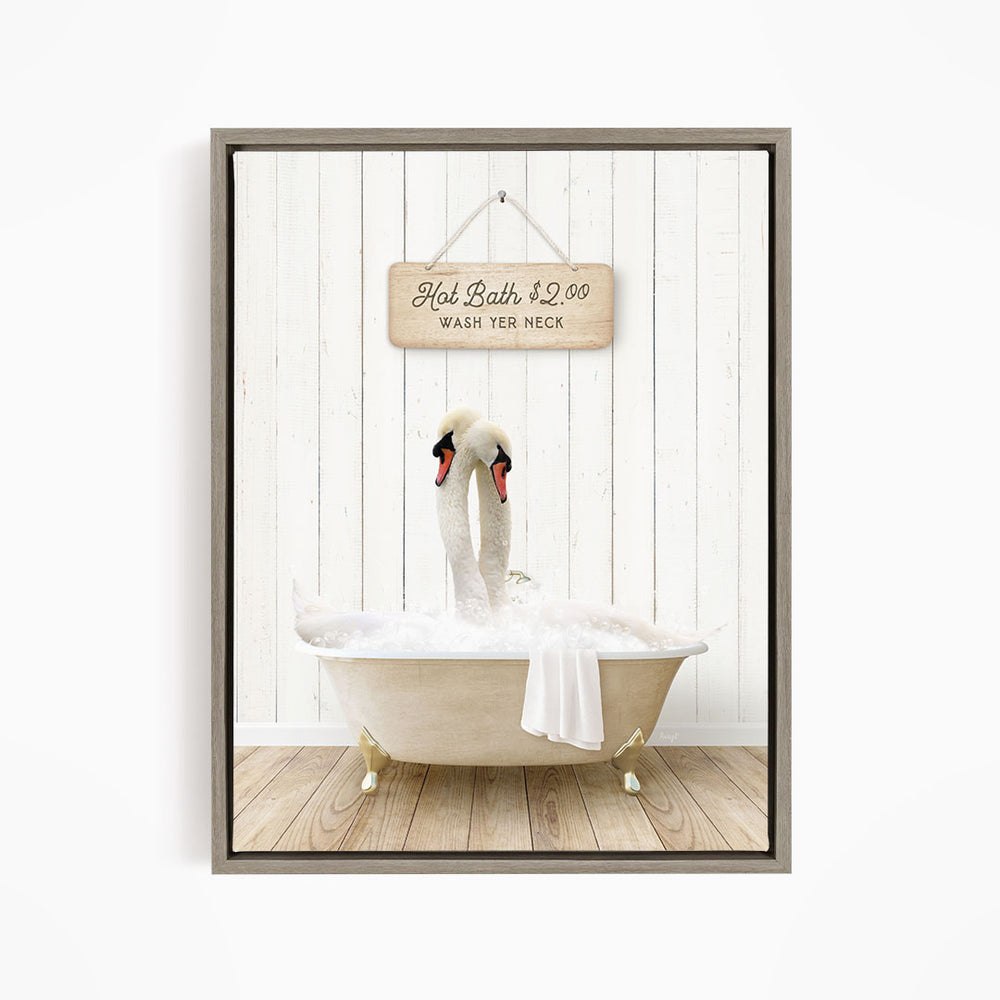 A framed image of two swans sitting in a bathtub, with a sign above them that reads "Hot Bath $2.00 WASH YER necks".