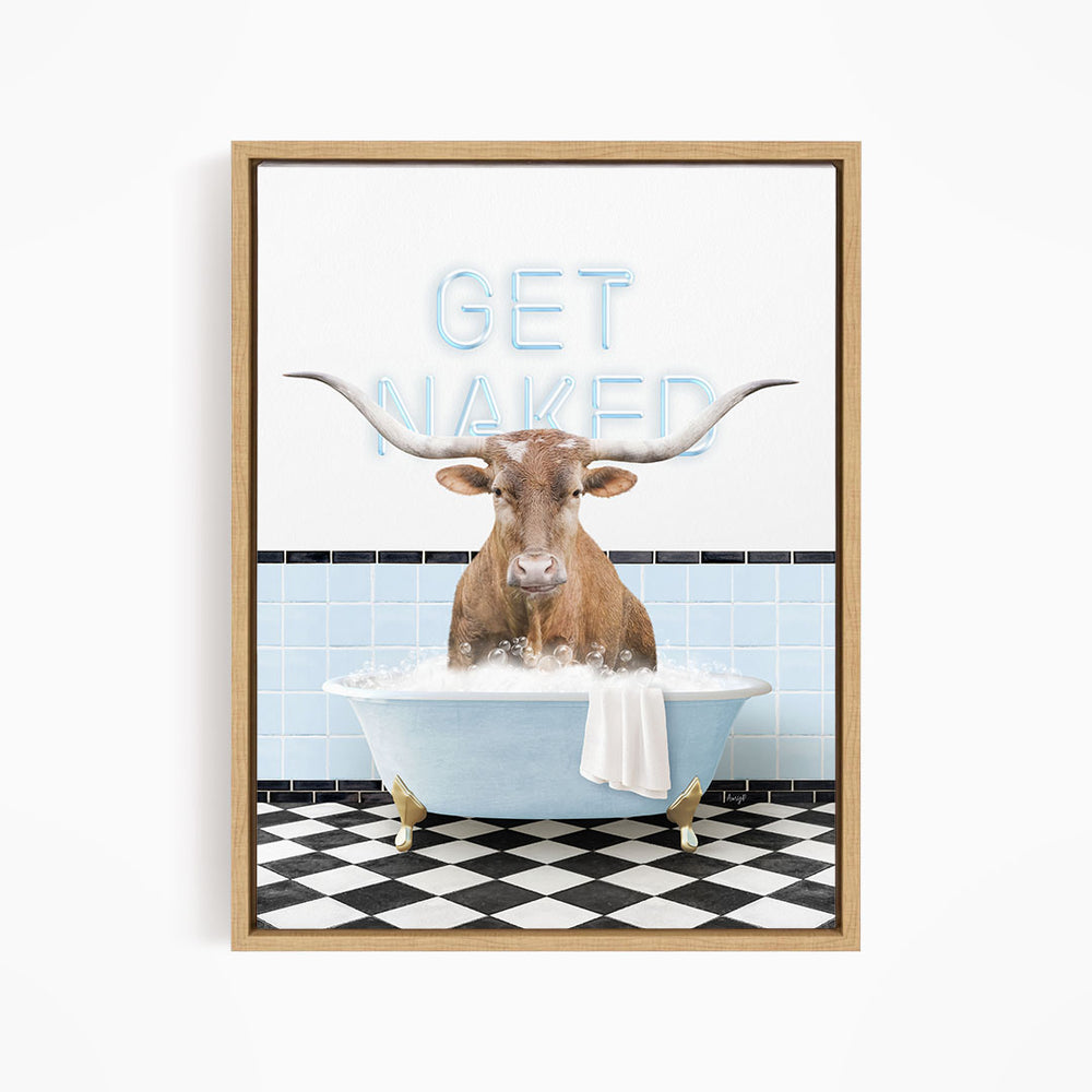 A framed image depicting a horned animal, likely a cow or bull, sitting in a bathtub filled with water and bubbles, with the text "GET NAKED" displayed above it.