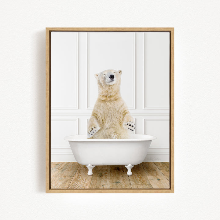 A polar bear standing in a white bathtub, with its paws hanging out of the tub.
