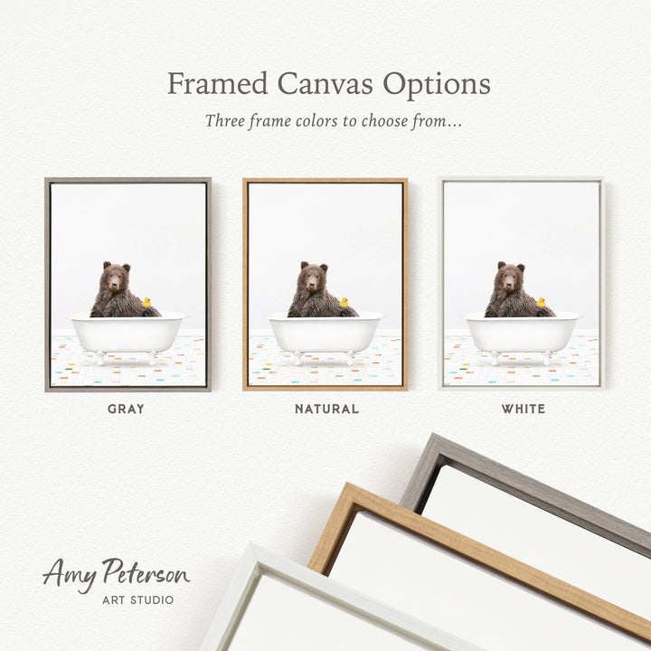 three framed canvas options, each featuring a bear sitting in a bathtub. The options include a gray frame, a natural frame, and a white frame. The bear in the bathtub is a rubber duck.