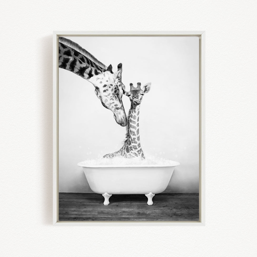 A mother giraffe and her baby giraffe enjoying a bath together in a white bathtub.