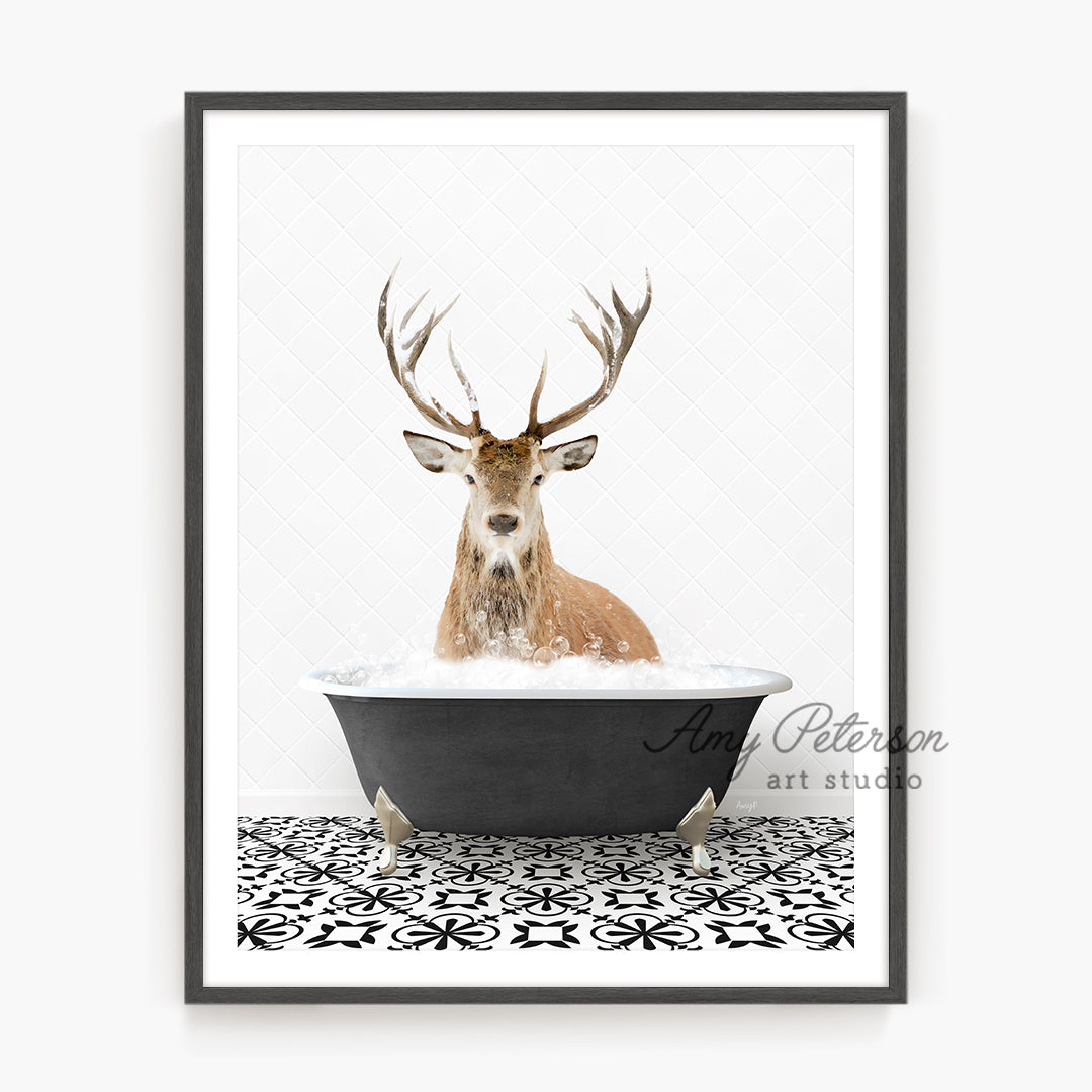 a picture of a deer sitting in a bathtub