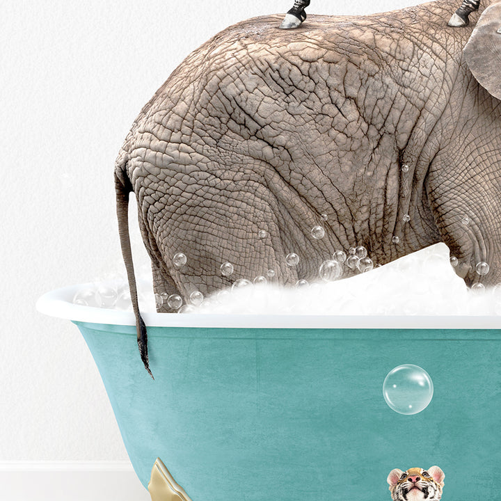 an elephant is taking a bath in a bathtub