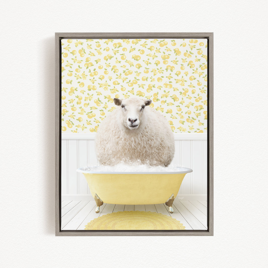 A fluffy white sheep sits in a yellow bathtub, surrounded by a yellow floral wallpaper.