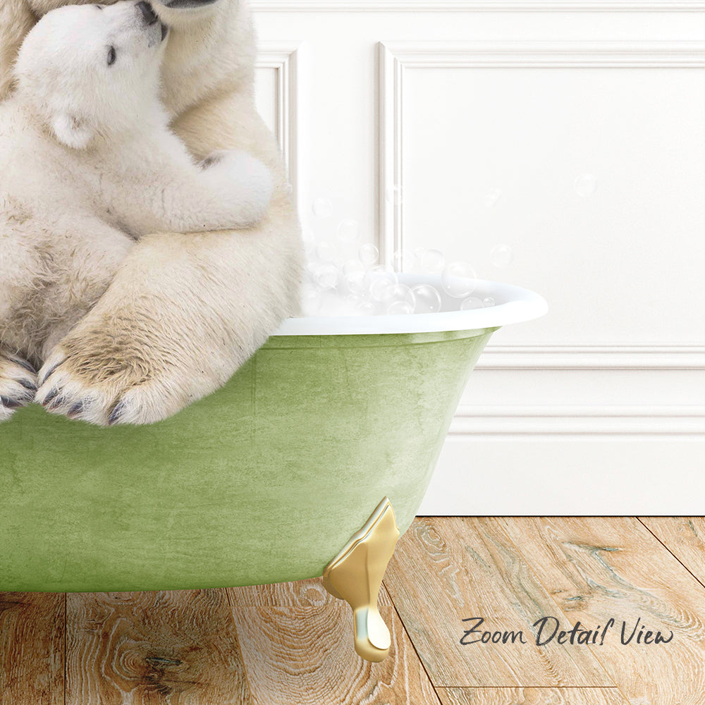A polar bear cub sitting in a green bathtub, with bubbles surrounding it, and a wooden floor in the background.