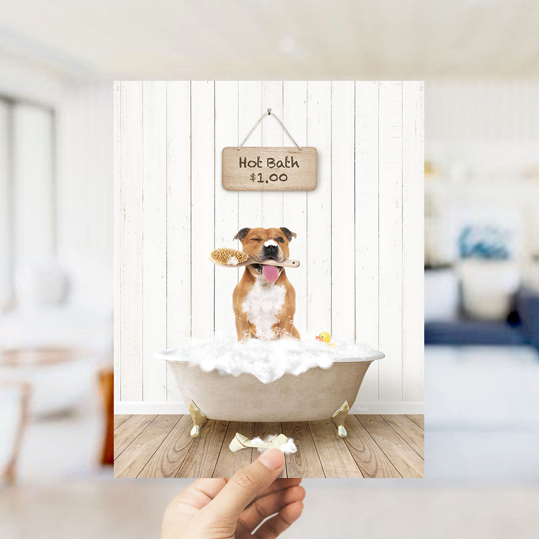 A brown and white dog sitting in a bathtub filled with bubbles, holding a brush in its mouth, with a sign that says "Hot Bath $1.00" above it.