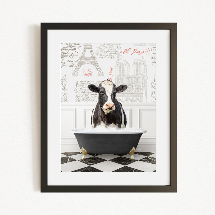 A black and white cow is sitting in a bathtub filled with water, surrounded by a checkered floor and a wall with the Eiffel Tower and other Parisian landmarks.