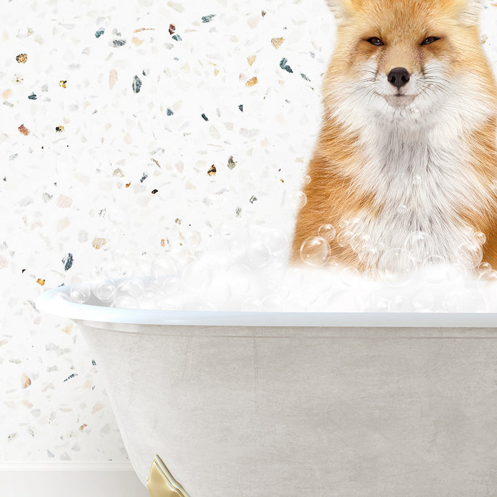 a dog sitting in a bathtub full of bubbles