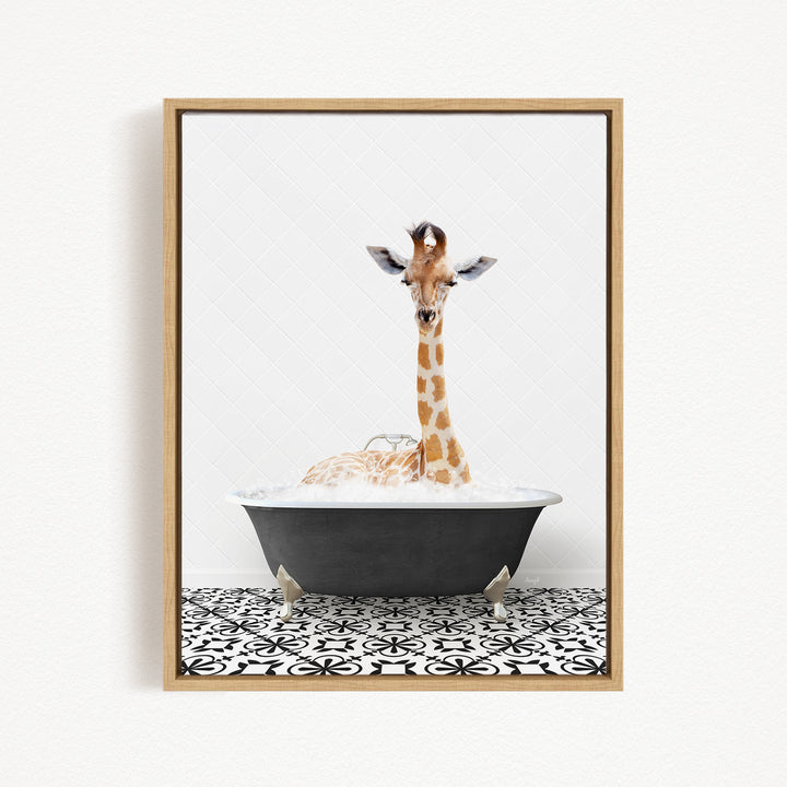 A giraffe is sitting in a black bathtub filled with water, creating a whimsical and playful scene.
