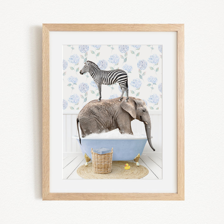 A zebra standing on an elephant's back in a bathtub, with a basket of rubber ducks nearby.