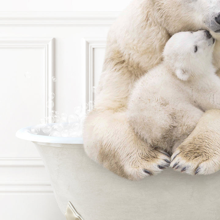 a mother polar bear cuddles her cub in a bathtub