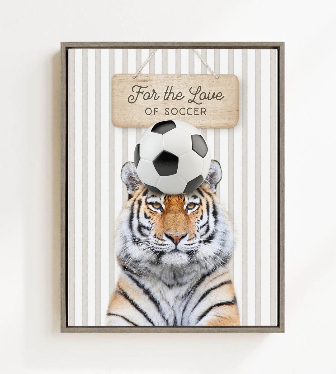 A tiger is standing in front of a sign that says "For the Love of Soccer".