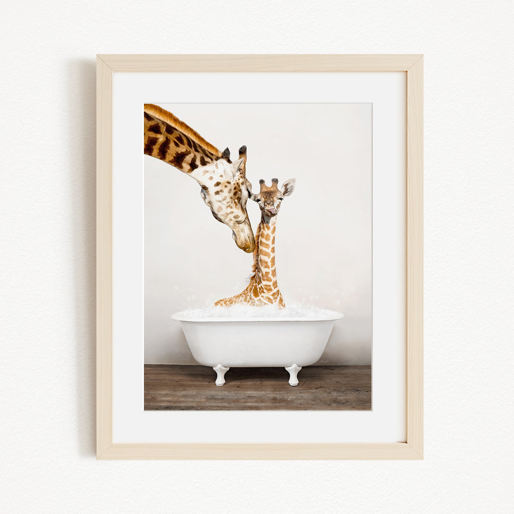 A mother giraffe and her baby giraffe are enjoying a relaxing bath together in a white bathtub.