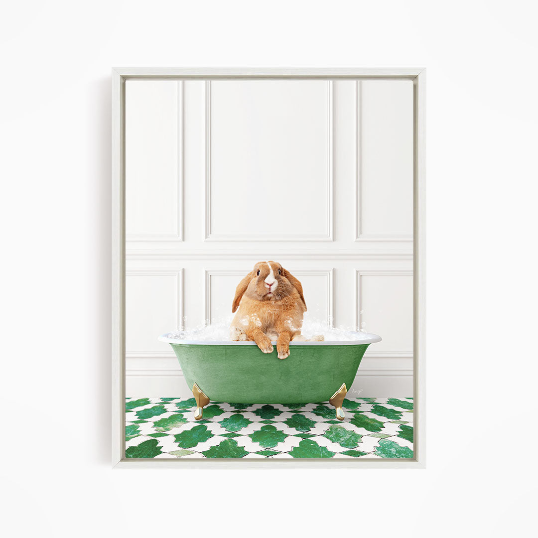 A brown rabbit sitting in a green bathtub filled with water, surrounded by a green and white patterned floor.