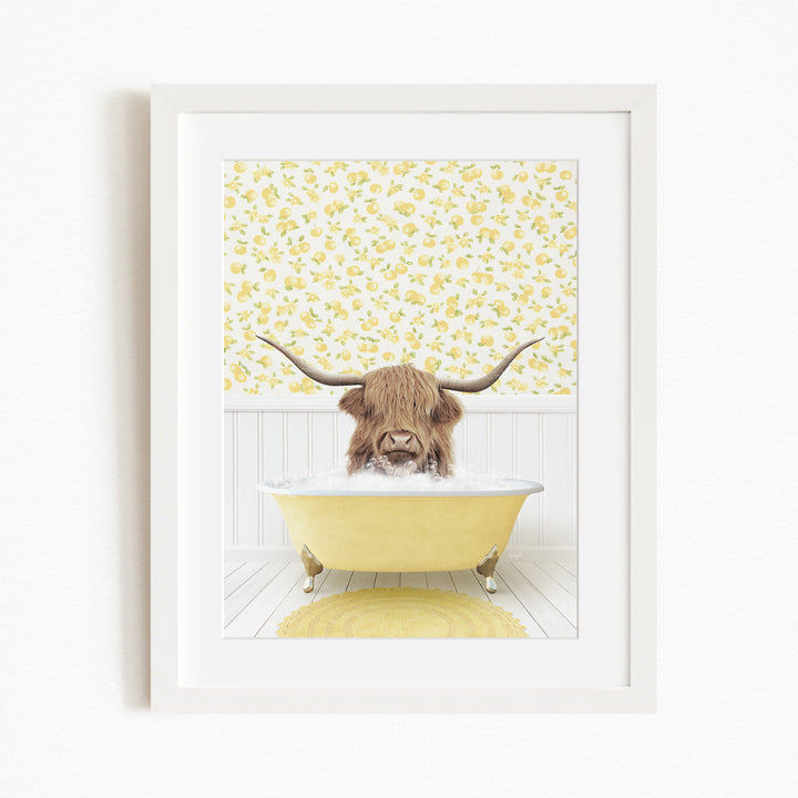 A brown cow with long horns is sitting in a yellow bathtub, surrounded by a yellow floral pattern on the wall behind it.